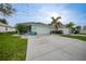 Home exterior showcasing driveway and landscaping at 526 Allen St, Punta Gorda, FL 33950