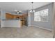 Bright dining area with tile floors and access to backyard at 5547 Wagon Wheel Dr, North Port, FL 34291