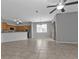 Kitchen with light wood cabinets, stainless steel appliances, and breakfast bar at 5547 Wagon Wheel Dr, North Port, FL 34291