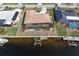 Bird's eye view of single-Gathering home, pool, and canal access at 625 Via Tunis, Punta Gorda, FL 33950