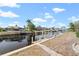 Private dock and canal access with boats in view at 625 Via Tunis, Punta Gorda, FL 33950