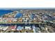 Aerial view of a waterfront community with many houses and boats at 66 Ocean Dr, Punta Gorda, FL 33950