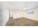 Bright bedroom featuring wood-look tile floors and ceiling fan at 66 Ocean Dr, Punta Gorda, FL 33950