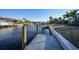 Private boat dock with concrete surface, perfect for enjoying waterfront living at 66 Ocean Dr, Punta Gorda, FL 33950