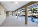 Covered patio with pool and canal views at 66 Ocean Dr, Punta Gorda, FL 33950