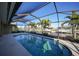 Screened pool with canal views at 66 Ocean Dr, Punta Gorda, FL 33950