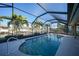 Relaxing screened-in pool with canal views at 66 Ocean Dr, Punta Gorda, FL 33950