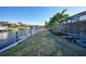 Private backyard with canal access and dock at 66 Ocean Dr, Punta Gorda, FL 33950