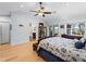 Spacious bedroom with a king bed and access to a bathroom at 700 N River Rd, Venice, FL 34293