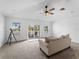 Bright bonus room with balcony access and ceiling fans at 700 N River Rd, Venice, FL 34293