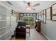 Bright home office features built-in shelving and hardwood floors at 700 N River Rd, Venice, FL 34293