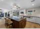 Modern kitchen boasts stainless steel appliances and a large island at 700 N River Rd, Venice, FL 34293