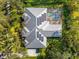 Bird's eye view of home showcasing roofline, pool, and solar panels at 7563 Albert Tillinghast Dr, Sarasota, FL 34240