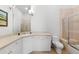 Clean bathroom, featuring a corner vanity and a shower at 7563 Albert Tillinghast Dr, Sarasota, FL 34240