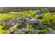 Aerial view of clubhouse and golf course at 7563 Albert Tillinghast Dr, Sarasota, FL 34240