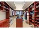 Large walk-in closet with ample shelving and hanging space at 7563 Albert Tillinghast Dr, Sarasota, FL 34240