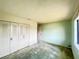 Bright bedroom featuring a large closet and neutral walls at 7570 Berwick St, North Port, FL 34287