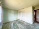 Spacious bedroom with ample closet space and carpeting at 7570 Berwick St, North Port, FL 34287