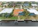 Aerial view of canal front home with dock and boat at 820 Via Tunis, Punta Gorda, FL 33950