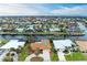 Aerial view of waterfront home with pool and canal access at 820 Via Tunis, Punta Gorda, FL 33950