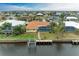 Backyard aerial view showcasing pool and canal access at 820 Via Tunis, Punta Gorda, FL 33950