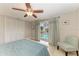 Bedroom with pool access and sliding glass doors at 820 Via Tunis, Punta Gorda, FL 33950