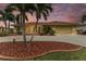 House exterior showcasing curb appeal and landscaping at 820 Via Tunis, Punta Gorda, FL 33950