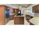 Modern kitchen with stainless steel appliances and granite countertops at 820 Via Tunis, Punta Gorda, FL 33950