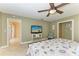 Main bedroom with a comfortable bed and access to the backyard at 820 Via Tunis, Punta Gorda, FL 33950