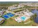 Community overview, showing pool, tennis courts, and buildings at 2060 Willow Hammock Cir # 302, Punta Gorda, FL 33983