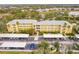 Condo building aerial view, showing parking and landscaping at 2060 Willow Hammock Cir # 302, Punta Gorda, FL 33983