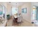 Bright dining room with table, chairs, and elegant chandelier at 26191 Copiapo Cir, Punta Gorda, FL 33983