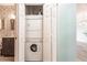 Stacked washer and dryer in a closet at 2060 Willow Hammock Cir # 302, Punta Gorda, FL 33983