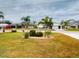 Residential neighborhood with single Gathering homes and lush landscaping at 26191 Copiapo Cir, Punta Gorda, FL 33983