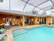 Relaxing pool and spa with covered patio and plenty of seating at 26191 Copiapo Cir, Punta Gorda, FL 33983