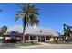 Exterior photo of the community clubhouse with tidy landscaping, sidewalk, and parking at 108 Pompano Se Dr # D, St Petersburg, FL 33705