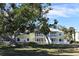 Two-story building with a charming exterior and landscaping at 108 Pompano Se Dr # D, St Petersburg, FL 33705