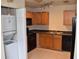 Kitchen with modern appliances and washer/dryer at 108 Pompano Se Dr # D, St Petersburg, FL 33705