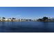 Scenic lake view showing the water feature and low-rise condos surrounding the community at 108 Pompano Se Dr # D, St Petersburg, FL 33705