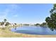 Serene lakefront property with lush landscaping at 108 Pompano Se Dr # D, St Petersburg, FL 33705