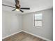 Bright bedroom featuring ceiling fan and vinyl plank flooring at 1219 Ansin St, Punta Gorda, FL 33950