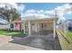 Updated single story home with carport and landscaped lawn at 1219 Ansin St, Punta Gorda, FL 33950