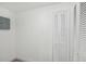 Laundry area with built-in closet and vinyl plank flooring at 1219 Ansin St, Punta Gorda, FL 33950