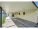 Covered patio with adjacent exterior wall at 1219 Ansin St, Punta Gorda, FL 33950