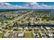 Wide aerial view of waterfront property, showcasing home and canal access at 125 Severin Se Rd, Port Charlotte, FL 33952
