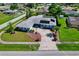 Aerial view of a single-Gathering home with a pool and large backyard at 125 Severin Se Rd, Port Charlotte, FL 33952