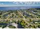 Wide aerial view of waterfront property, showcasing home and canal access at 125 Severin Se Rd, Port Charlotte, FL 33952