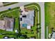 An aerial view of a home with a pool and a large backyard at 125 Severin Se Rd, Port Charlotte, FL 33952