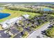 Aerial view showing community with golf course and clubhouse at 14138 Poppy Field Loop # 4122, Punta Gorda, FL 33955