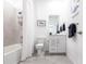 Clean bathroom with white vanity, shower/tub combo, and updated fixtures at 14138 Poppy Field Loop # 4122, Punta Gorda, FL 33955